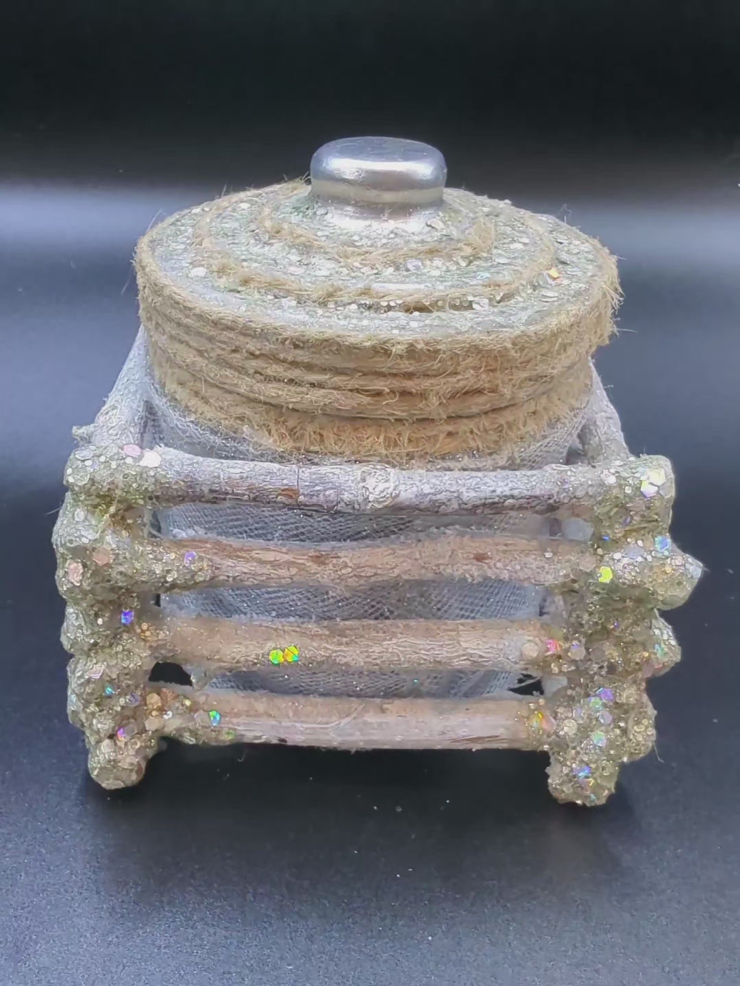 Silver and white lighted jar